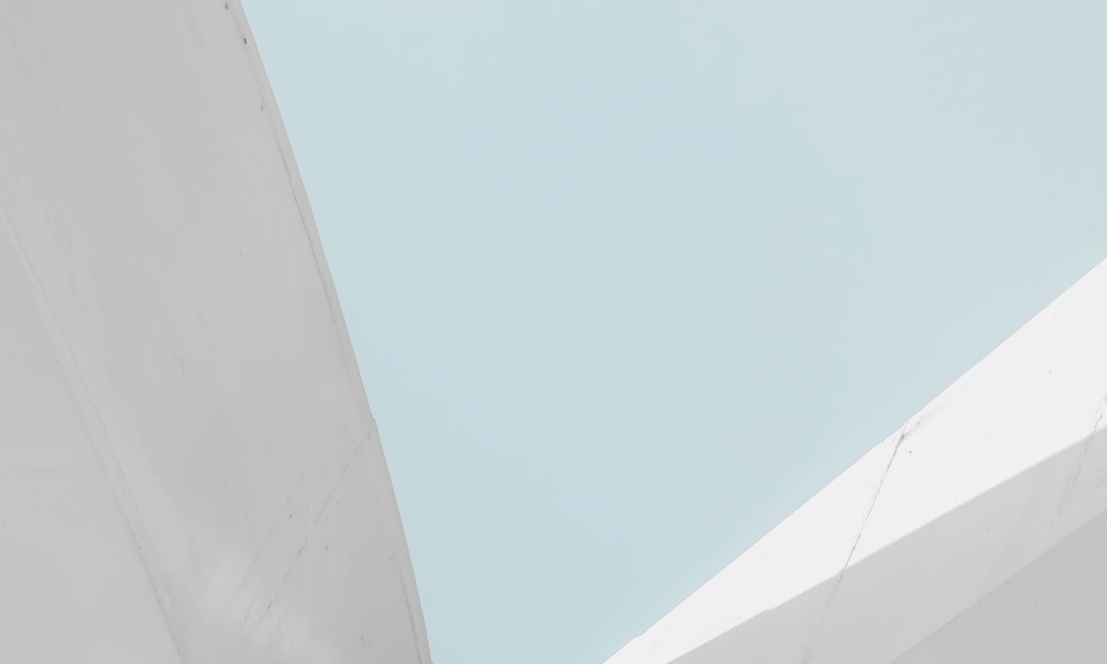 a man riding a skateboard down the side of a ramp
